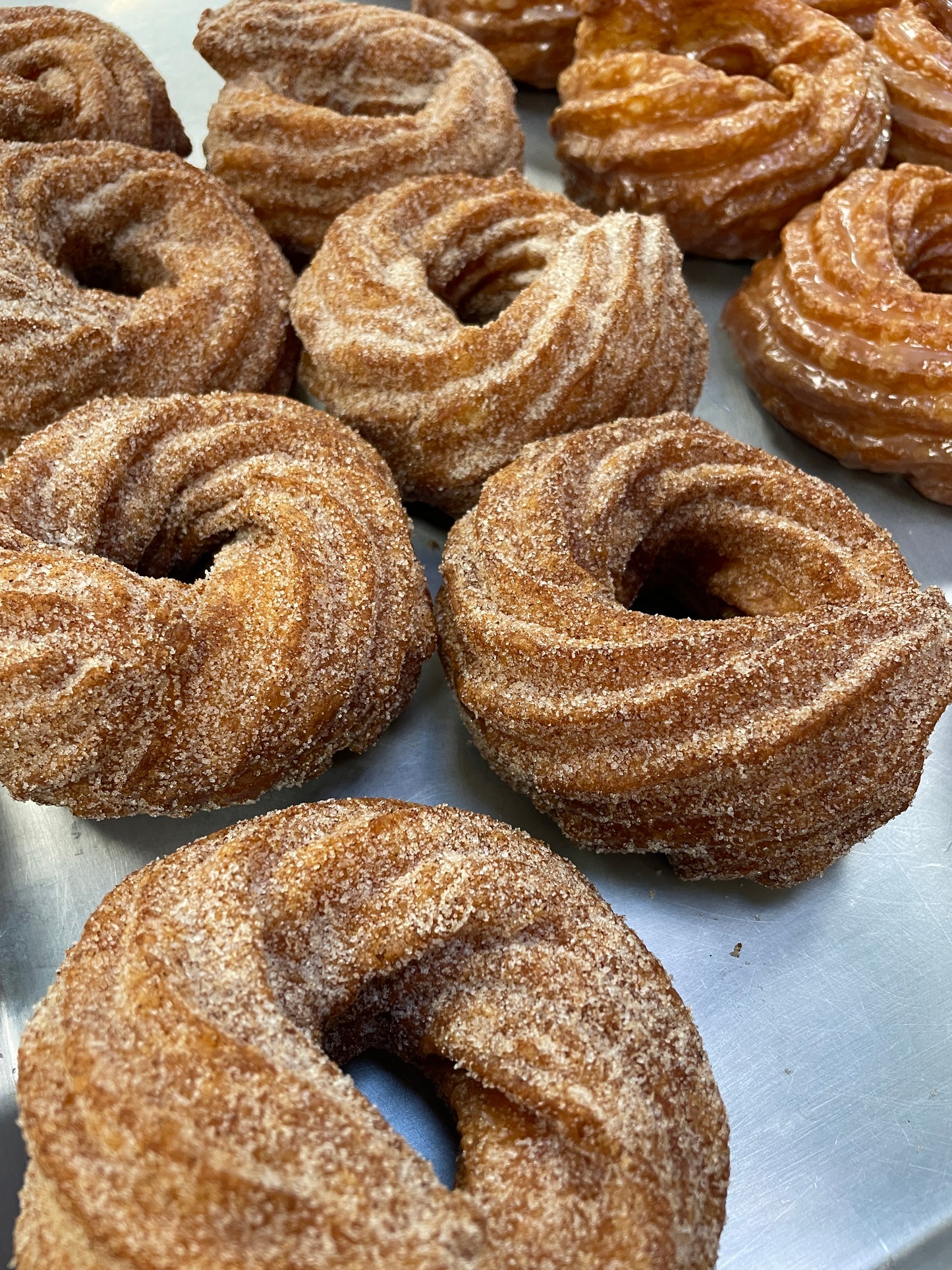 Tray full of the Best handcrafted Crullers Niagara, Cinnamon sugar, St. Catharines Doughnut