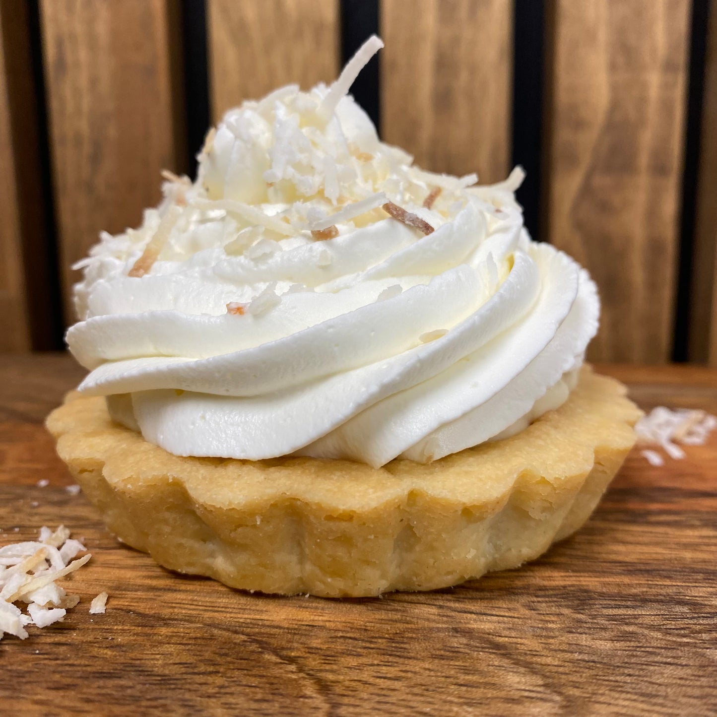 Artisan shortbread crust tart filled with handcrafted coconut cream filling, topped with real whipped cream and toasted coconut, Bakery St. Catharines