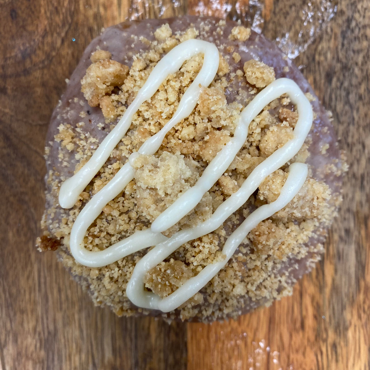 Top down view of peaches and cream cheesecake doughnut Niagara bakery pastries 
