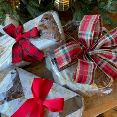 Our hand crafted artisan holiday Christmas fruit cakes aged and packaged ready for enjoyment this holiday.